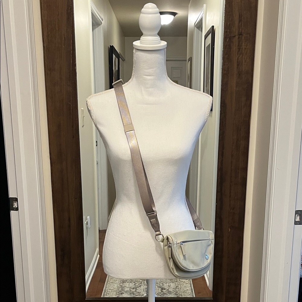 Lululemon Stylish Cream Small Curved Crossbody Bag